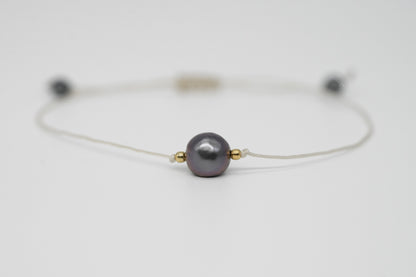 Armband mit großer dunkler Süßewasserperle