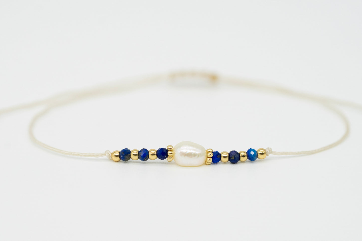 Lapislazuli Armband mit Süßwasserperle | geknüpft